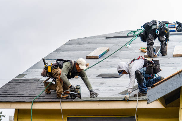 Professional Gutter Installation technician working in Methuen, MA